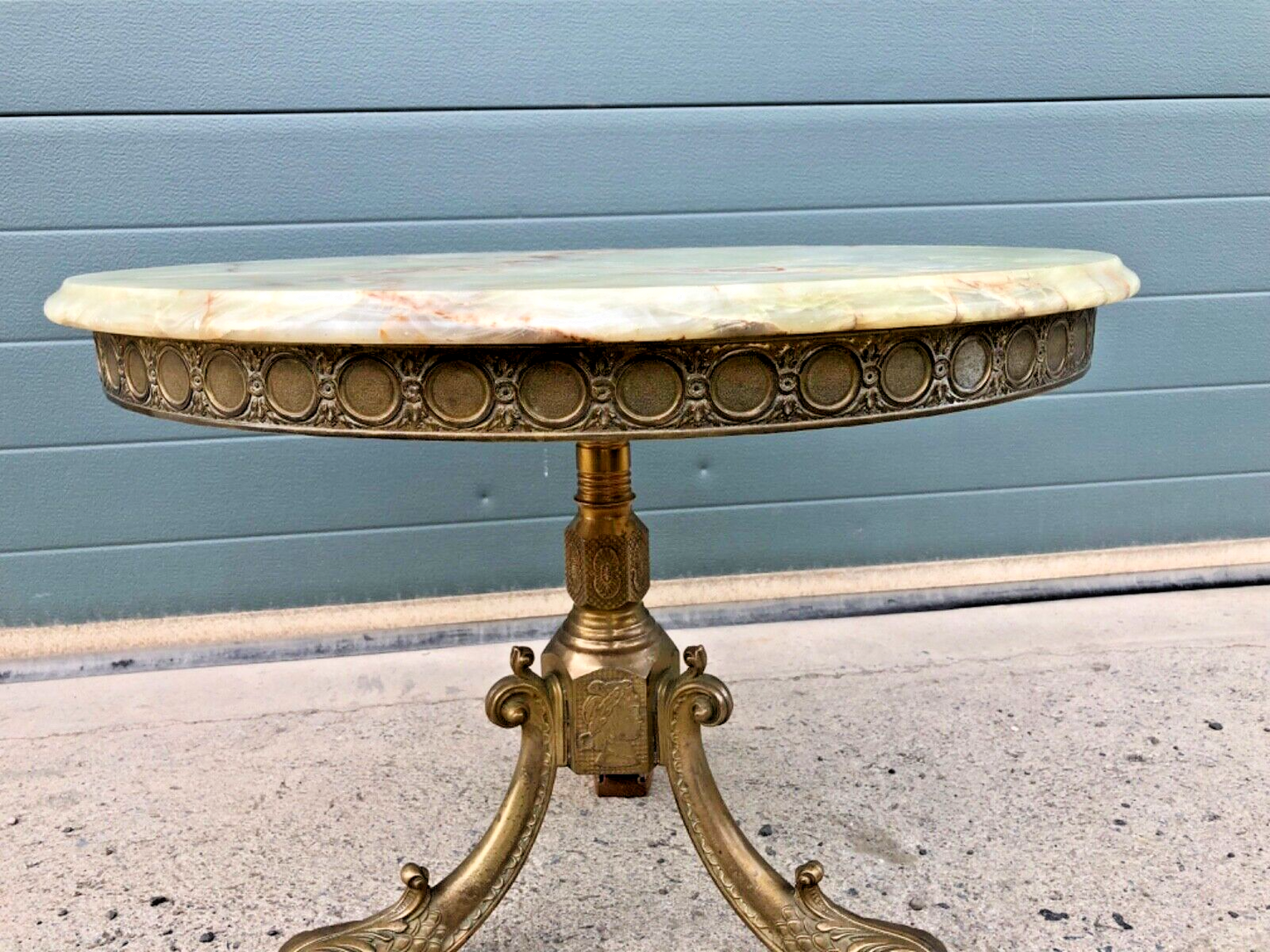 000832....Round Onyx Coffee Table On Decorative Dolphin Brass Base. ( Sold )