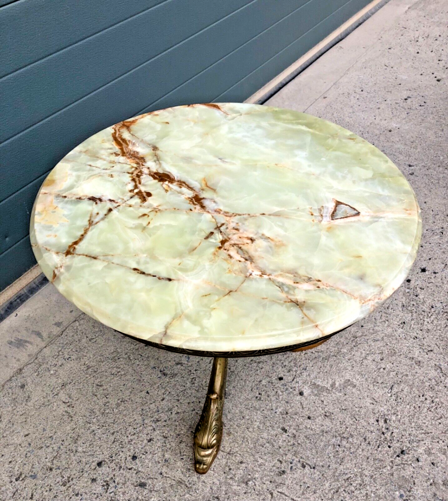 000832....Round Onyx Coffee Table On Decorative Dolphin Brass Base. ( Sold )