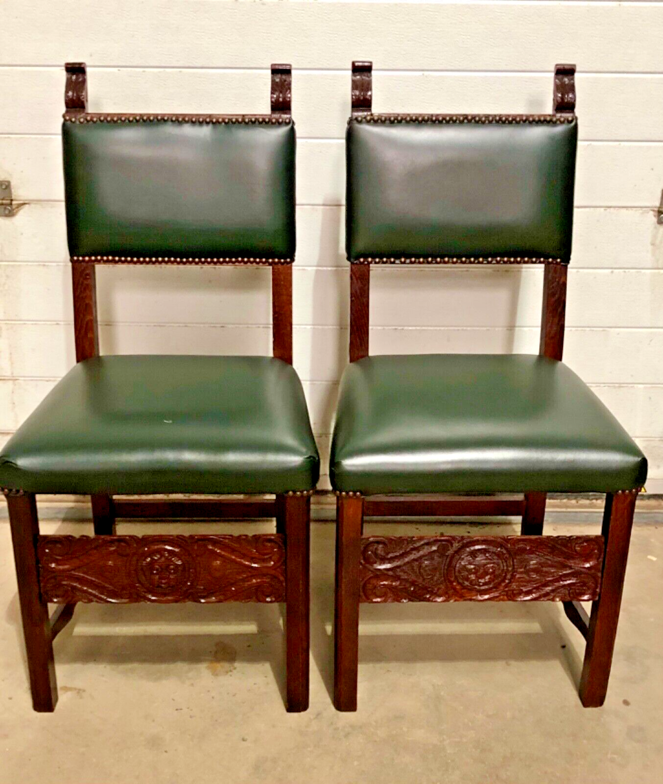000847....Handsome Pair Of Carved Oak Hall Chairs With Green Leather Upholstery ( sold )