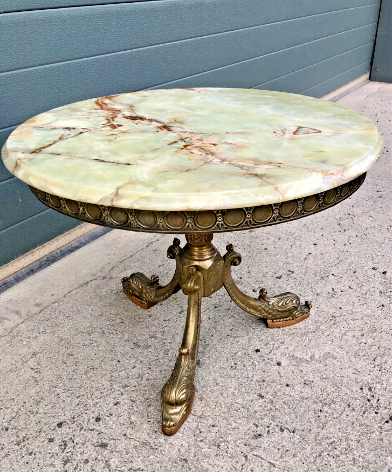 000832....Round Onyx Coffee Table On Decorative Dolphin Brass Base. ( Sold )