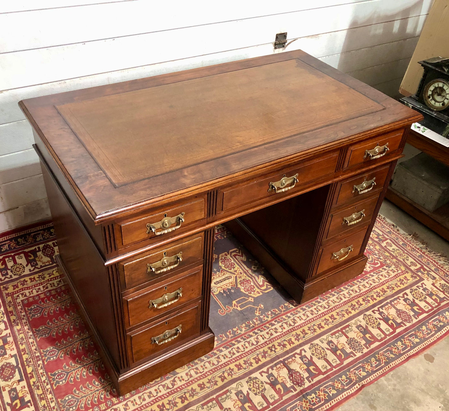 000639....Handsome Antique Walnut Pedestal Desk With Nine Drawers