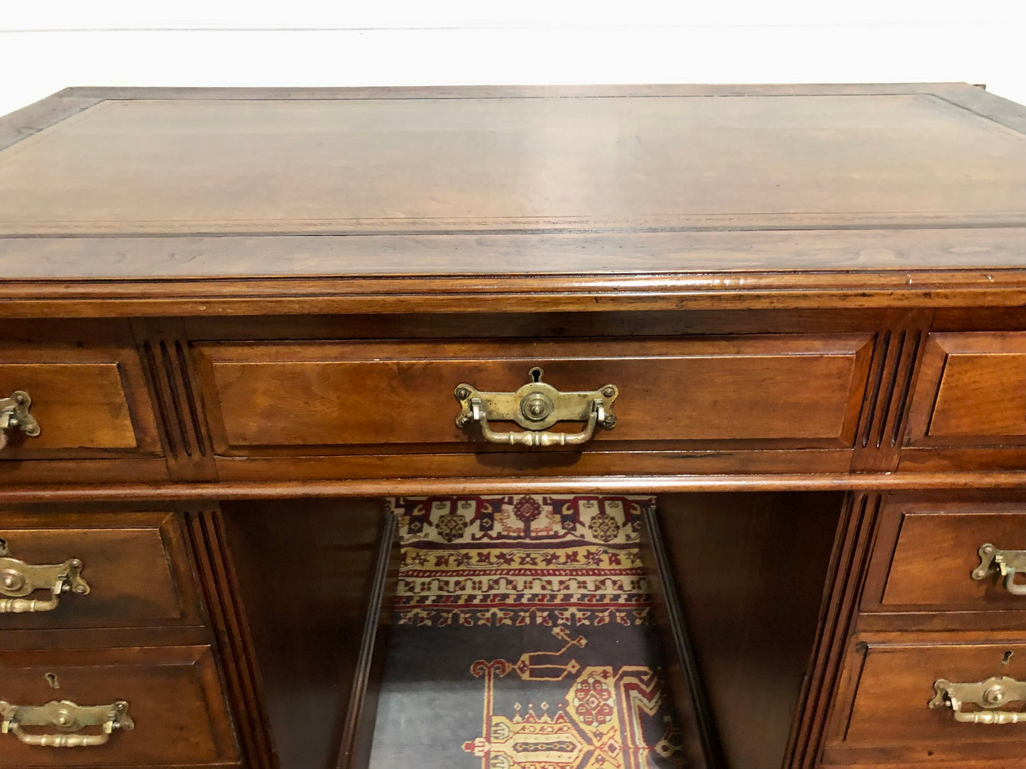 000639....Handsome Antique Walnut Pedestal Desk With Nine Drawers
