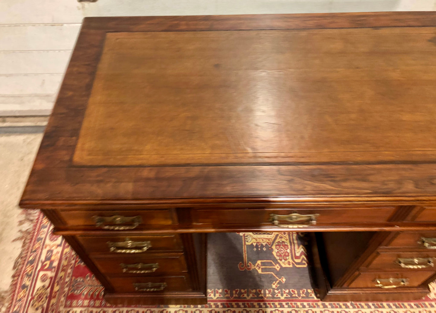 000639....Handsome Antique Walnut Pedestal Desk With Nine Drawers