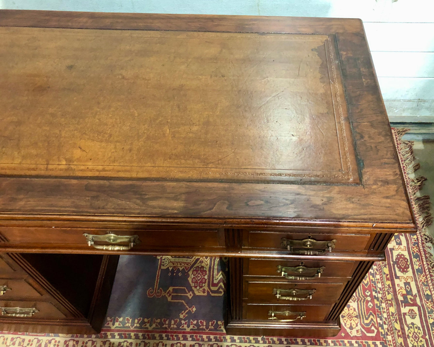 000639....Handsome Antique Walnut Pedestal Desk With Nine Drawers