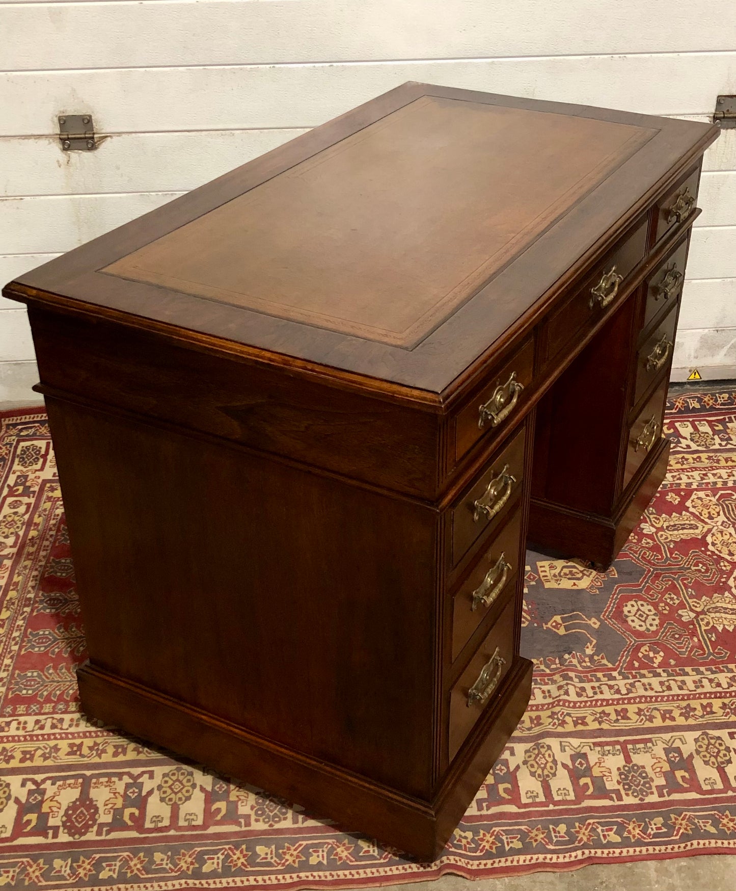 000639....Handsome Antique Walnut Pedestal Desk With Nine Drawers