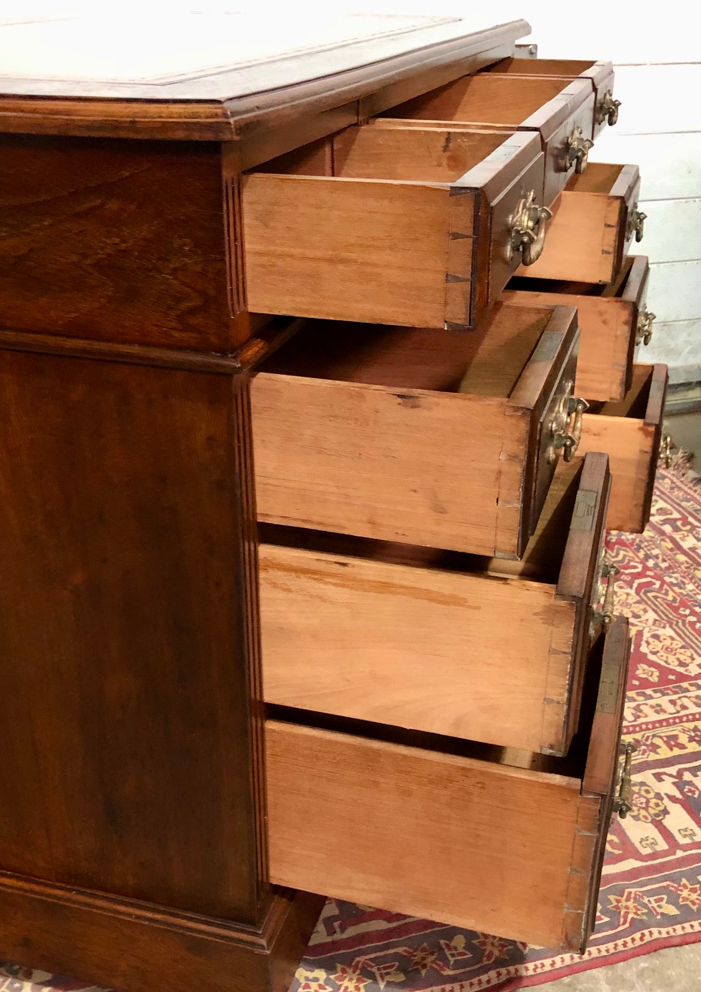 000639....Handsome Antique Walnut Pedestal Desk With Nine Drawers
