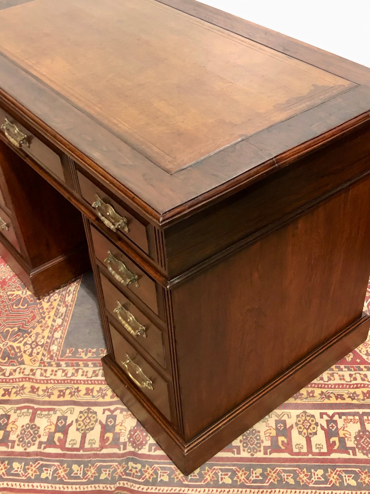 000639....Handsome Antique Walnut Pedestal Desk With Nine Drawers