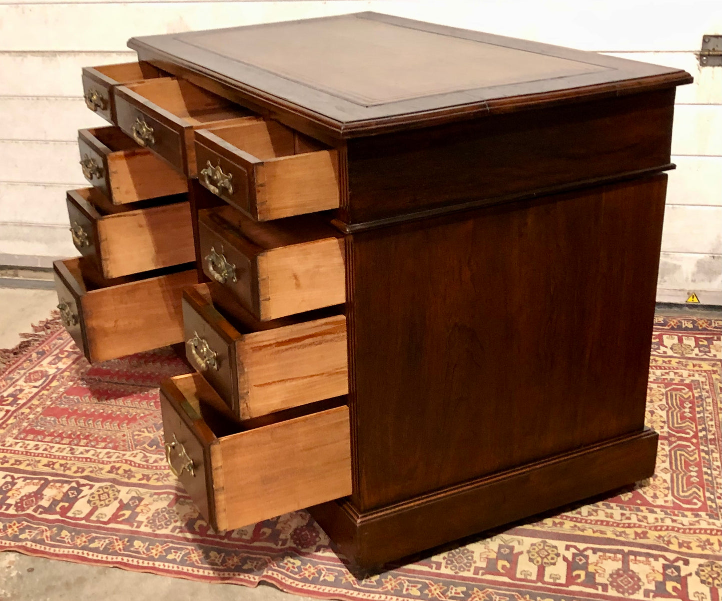 000639....Handsome Antique Walnut Pedestal Desk With Nine Drawers