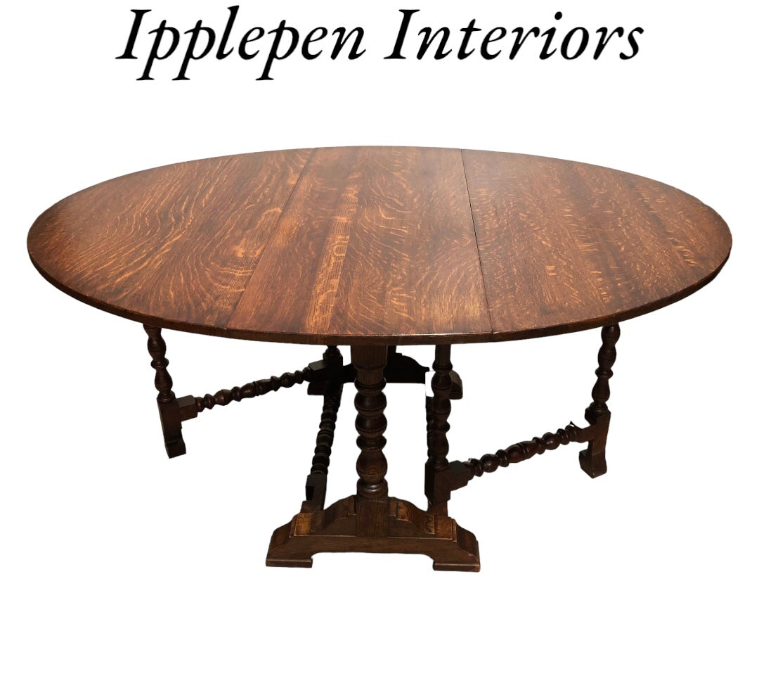 000870.....Handsome Vintage Solid Oak Gateleg / Drop Leaf Dining Table ( sold )