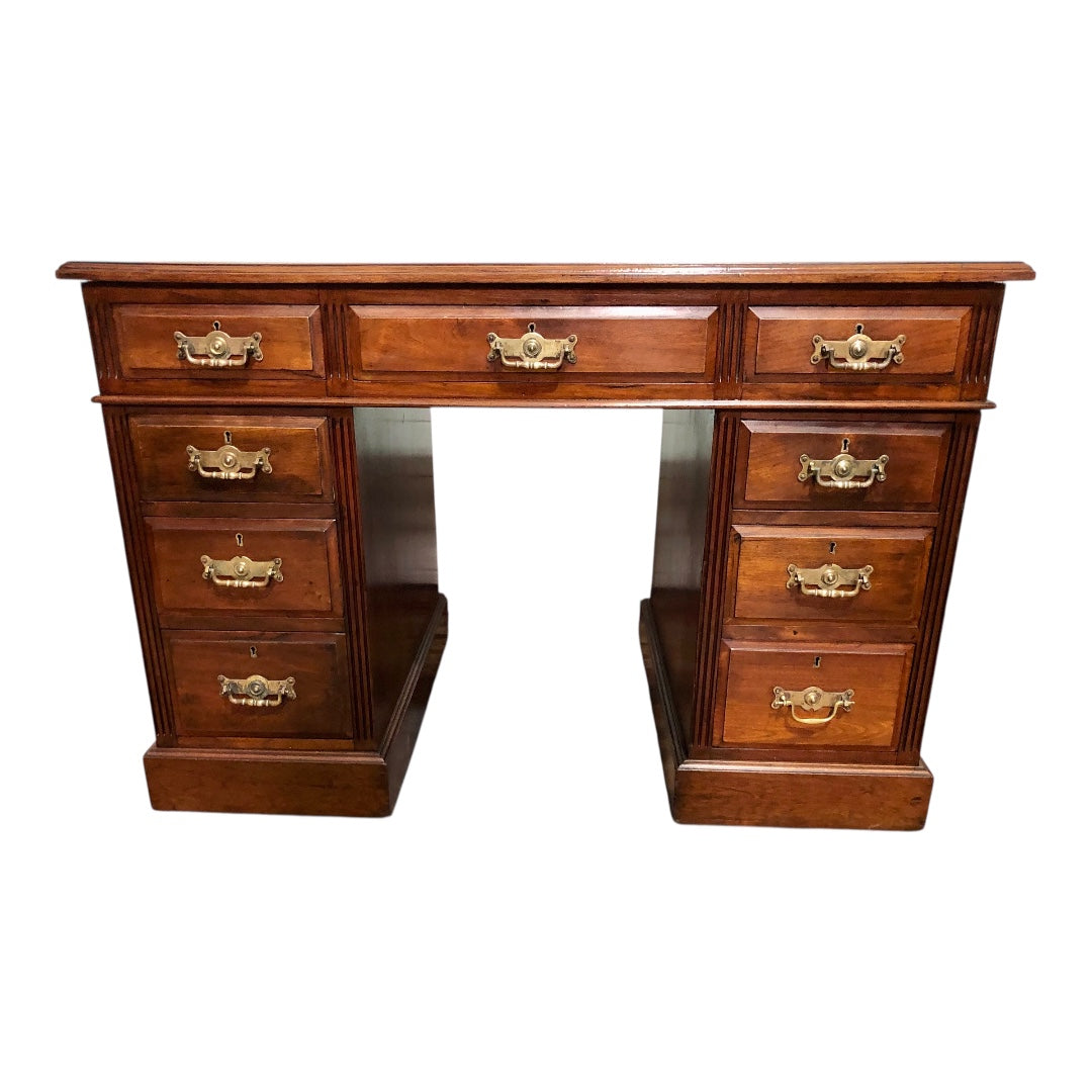 000639....Handsome Antique Walnut Pedestal Desk With Nine Drawers