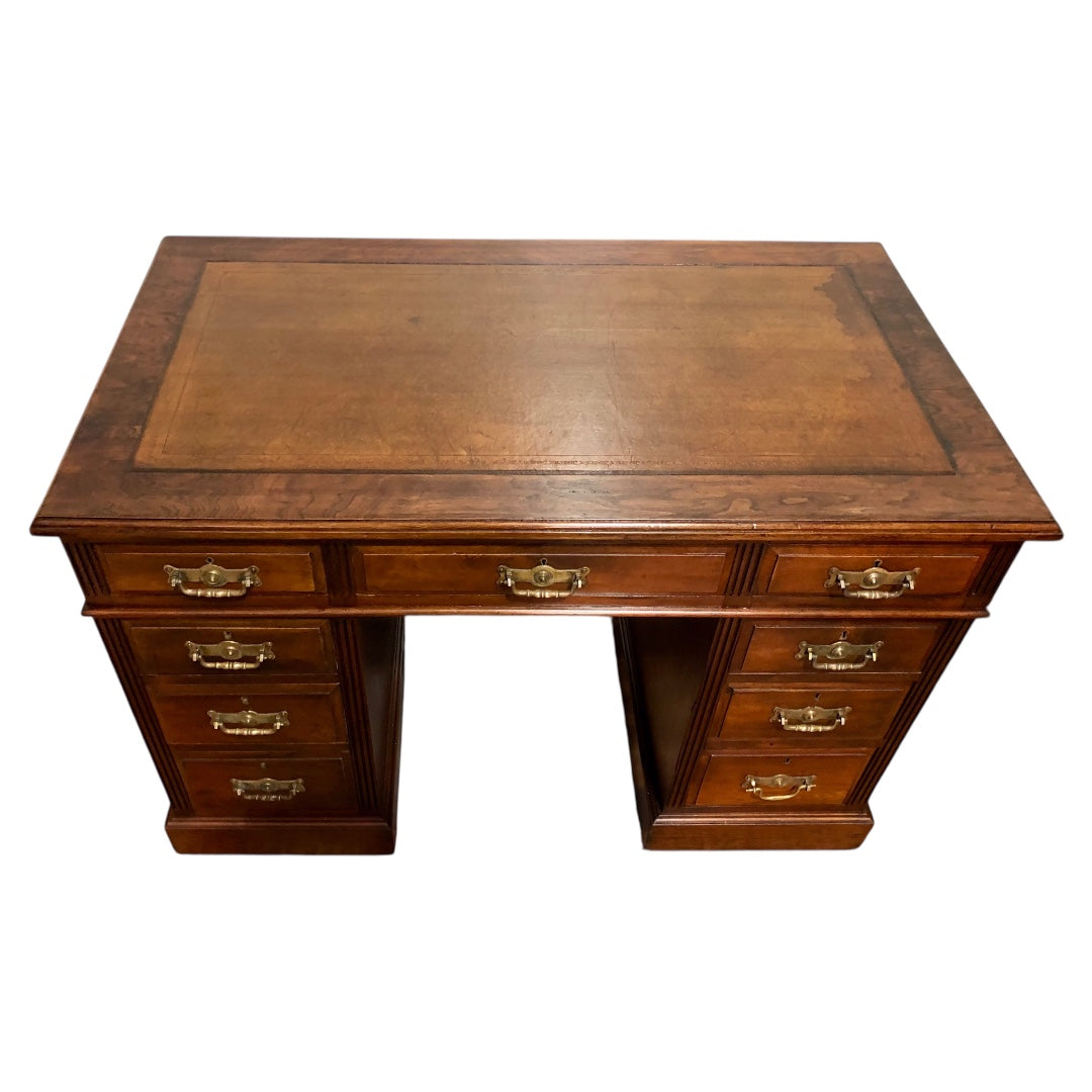 000639....Handsome Antique Walnut Pedestal Desk With Nine Drawers