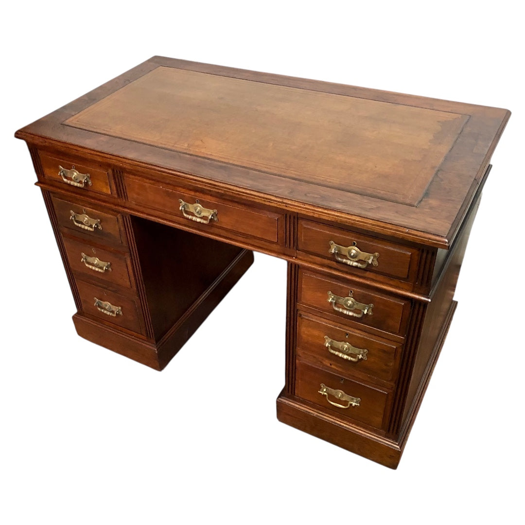 000639....Handsome Antique Walnut Pedestal Desk With Nine Drawers