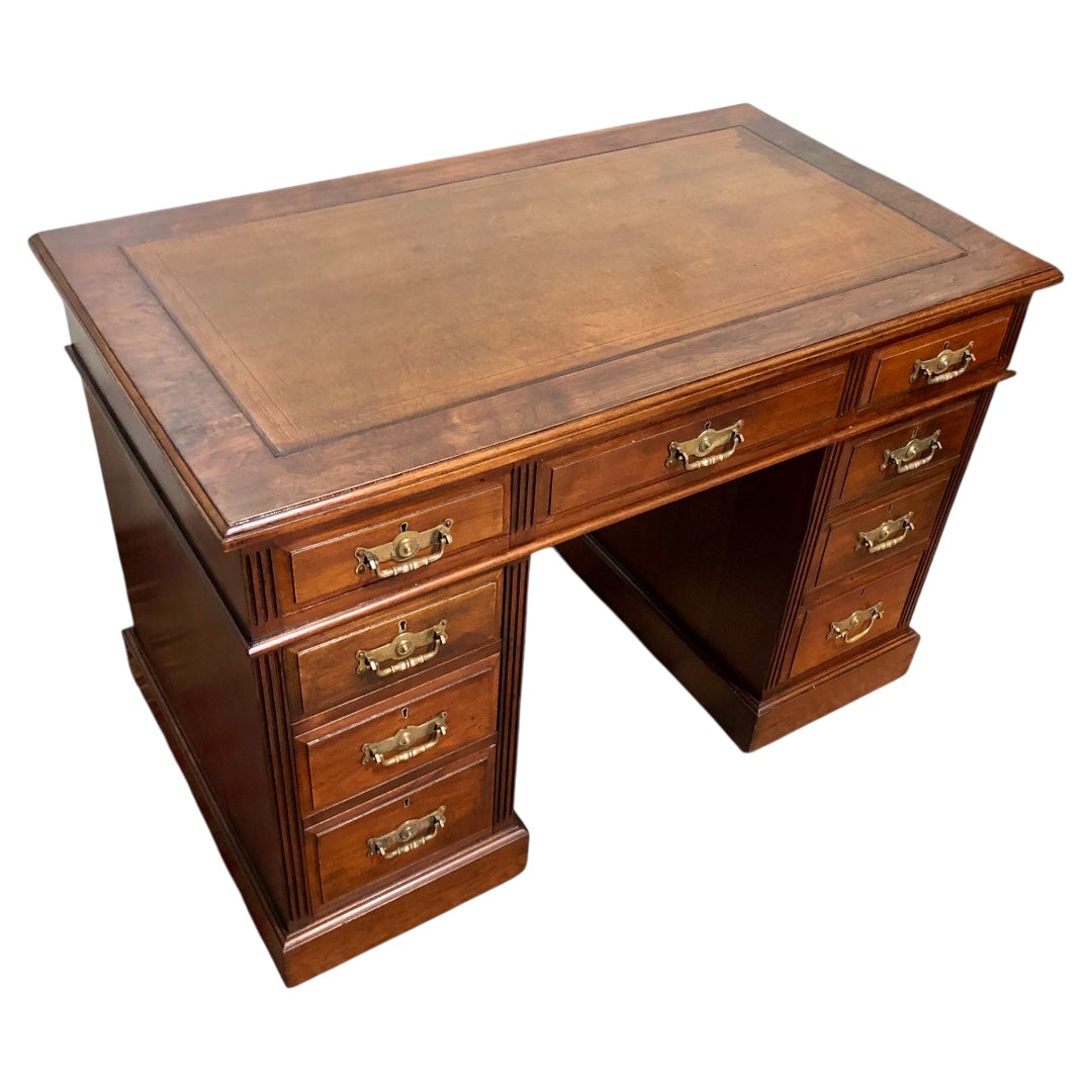 000639....Handsome Antique Walnut Pedestal Desk With Nine Drawers