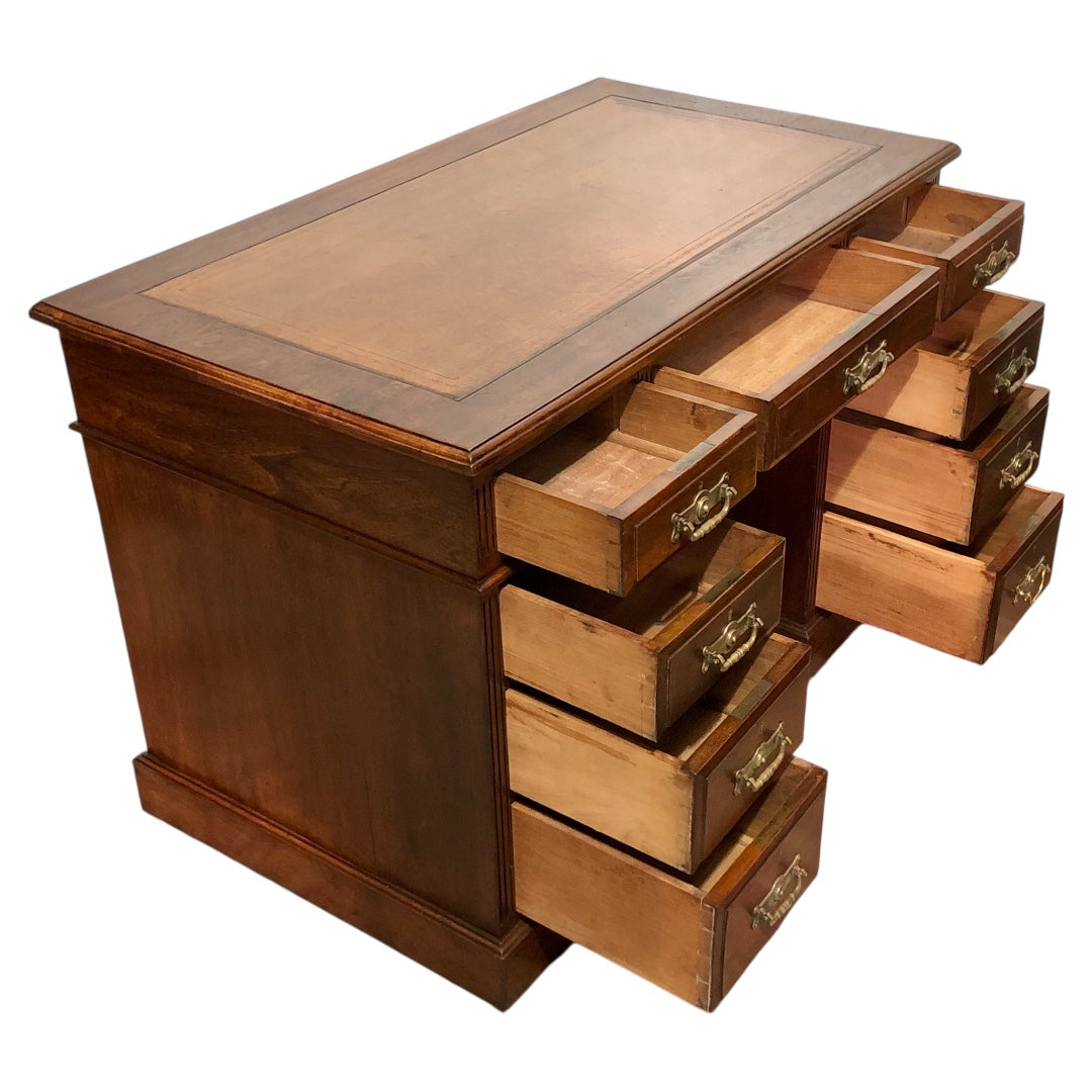 000639....Handsome Antique Walnut Pedestal Desk With Nine Drawers