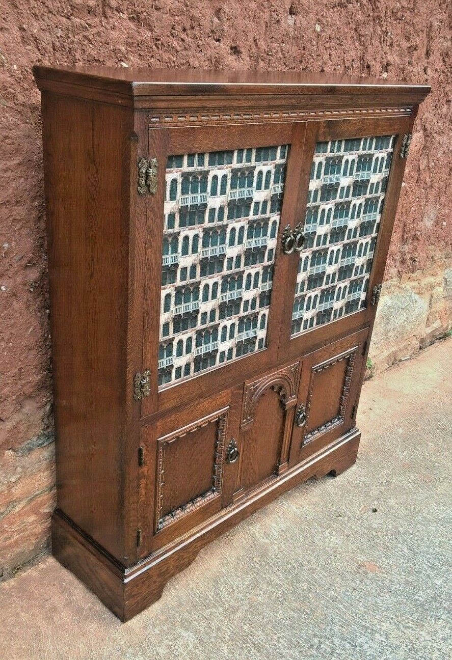 328.....Old Charm Oak Bookcase Or Vintage Carved Oak Cabinet ( SOLD )