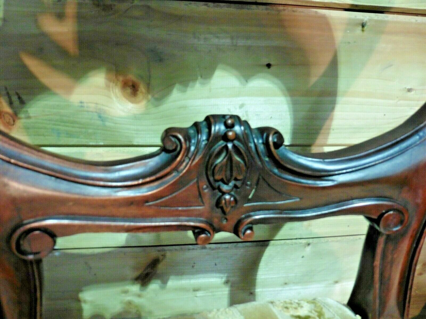 A Set Of Four Antique Carved Mahogany Balloon Back Dining Chairs