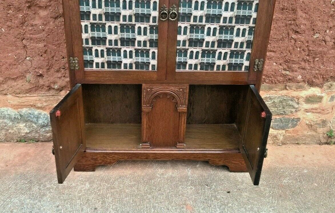 328.....Old Charm Oak Bookcase Or Vintage Carved Oak Cabinet ( SOLD )