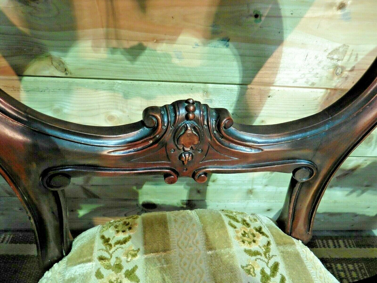 A Set Of Four Antique Carved Mahogany Balloon Back Dining Chairs