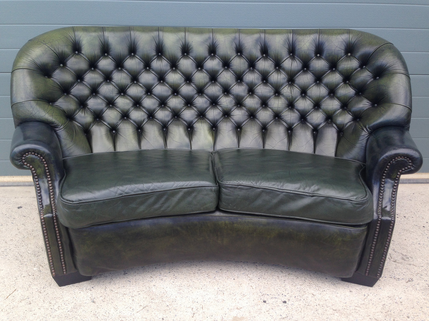 Handsome Curved Two Seat Chesterfield Leather Sofa ( SOLD )
