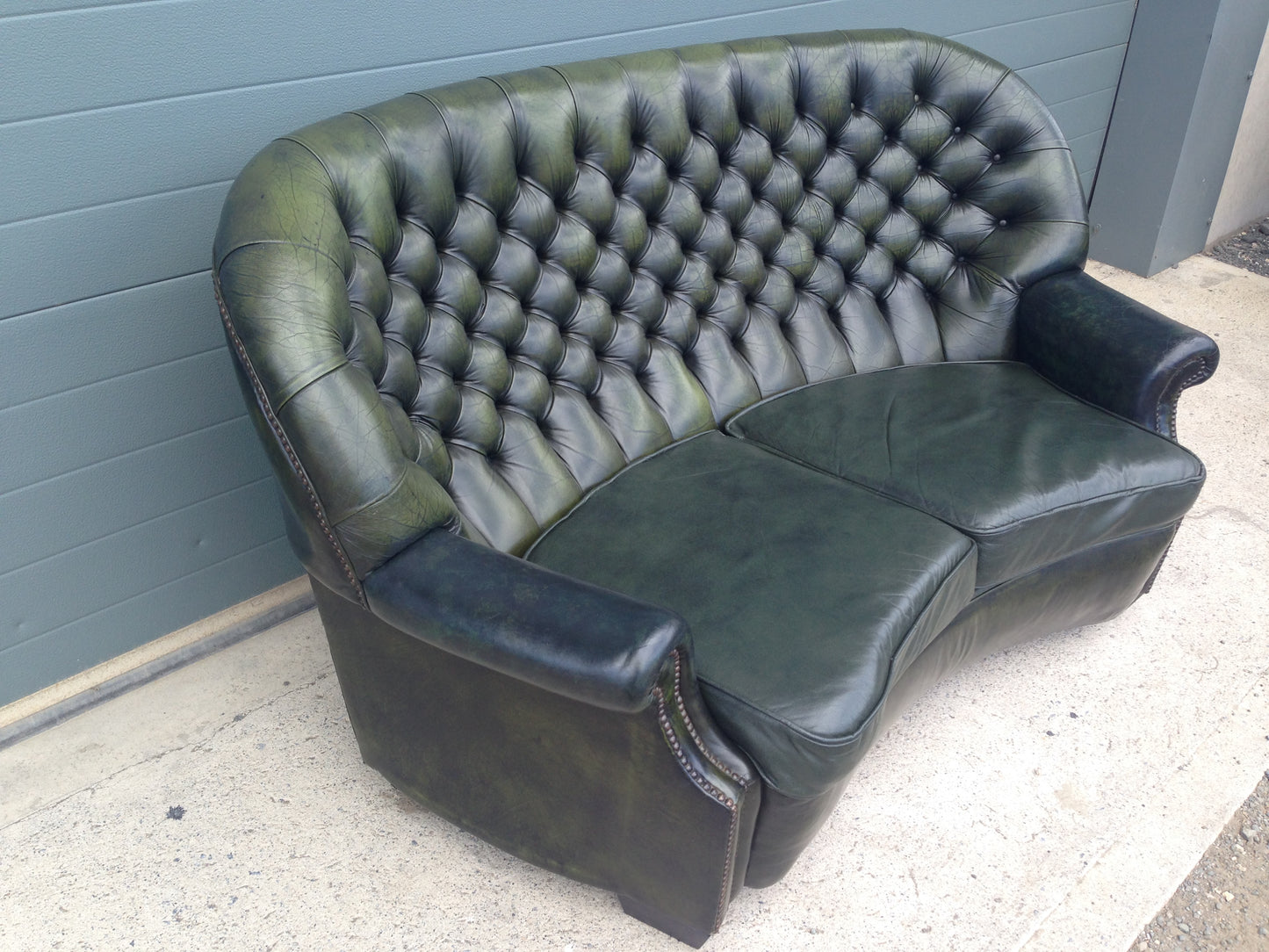 Handsome Curved Two Seat Chesterfield Leather Sofa ( SOLD )