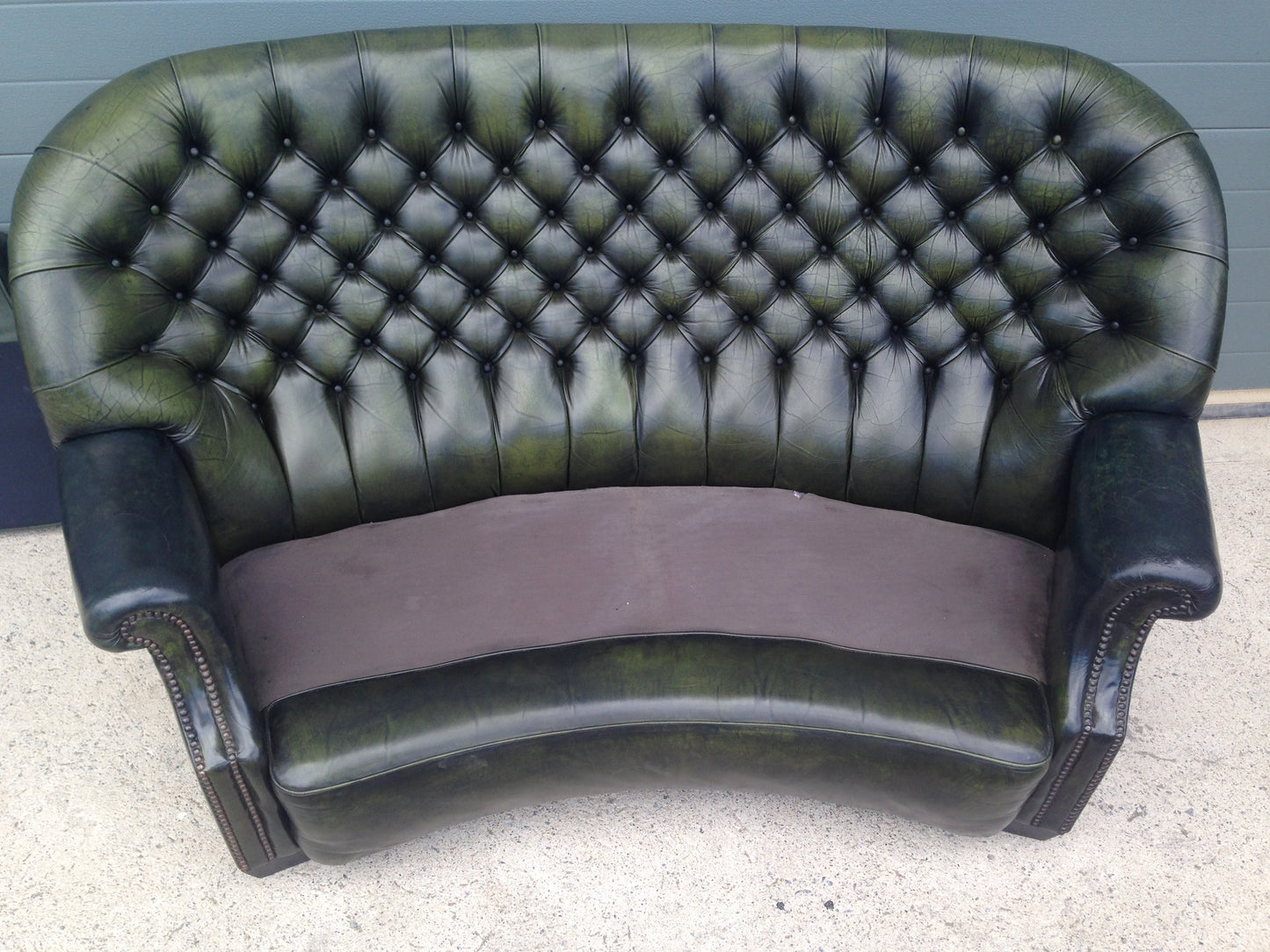 Handsome Curved Two Seat Chesterfield Leather Sofa ( SOLD )