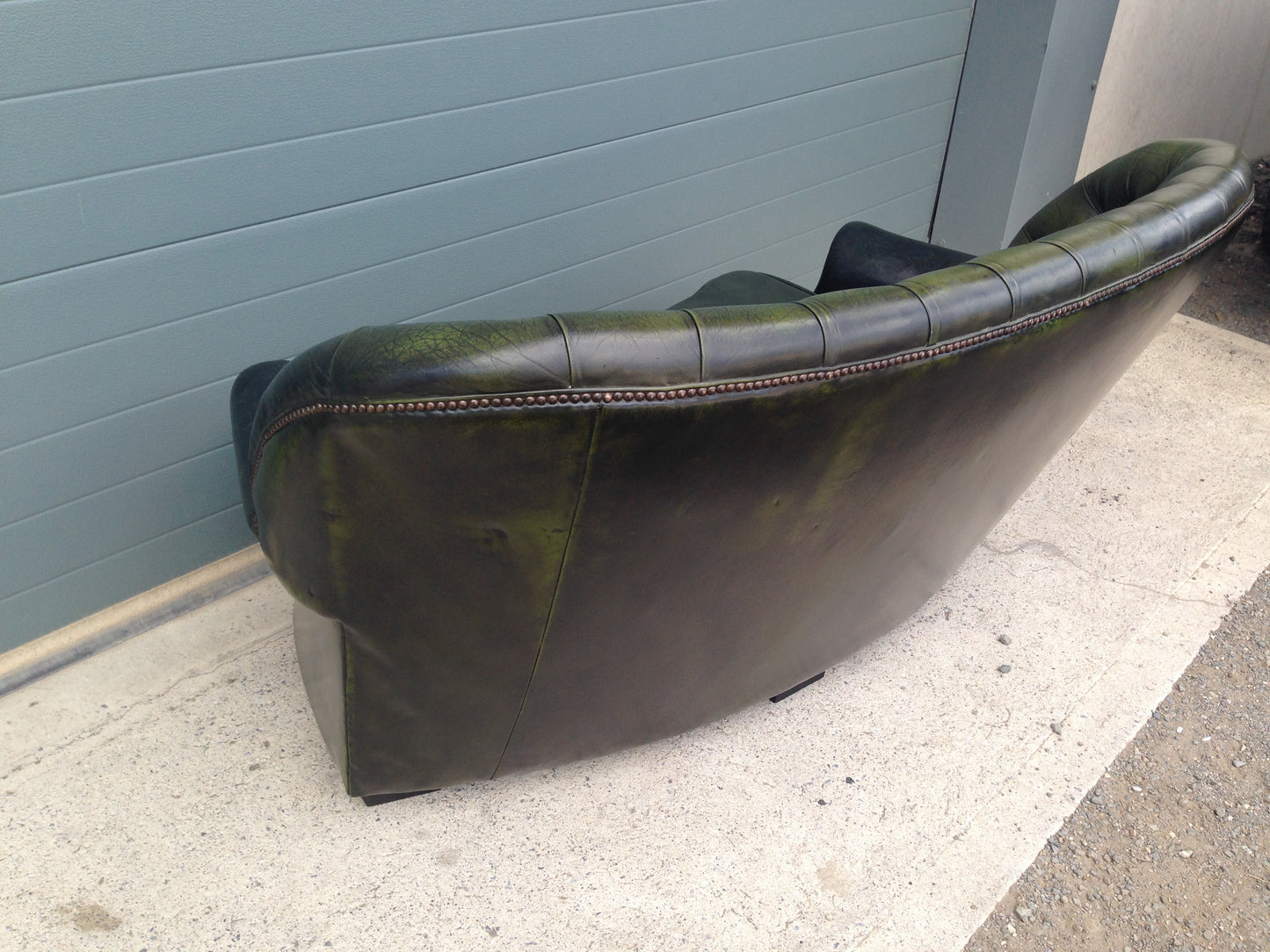 Handsome Curved Two Seat Chesterfield Leather Sofa ( SOLD )