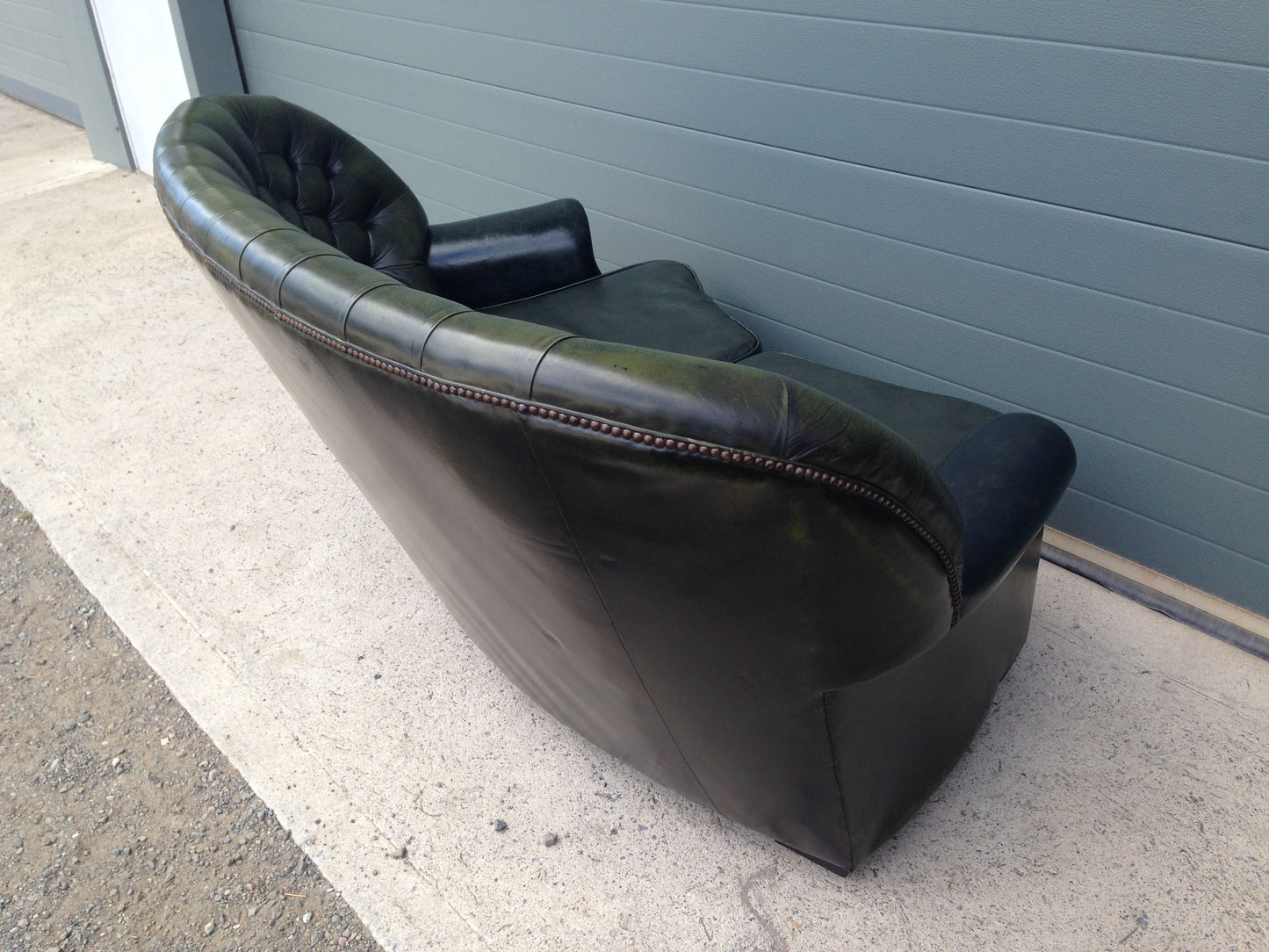 Handsome Curved Two Seat Chesterfield Leather Sofa ( SOLD )