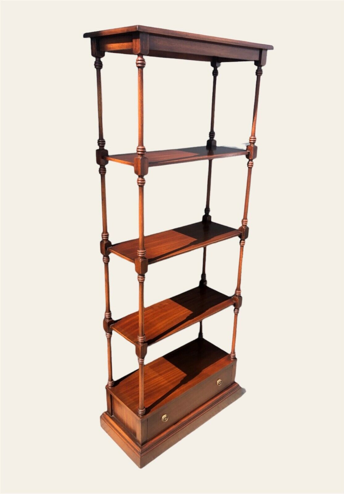 000975.....Vintage Reprodux Mahogany Shelving Unit With Drawer ( sold )