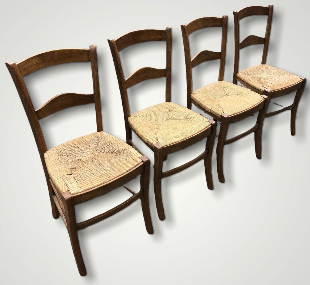 A Set Of Four Vintage Arts And Crafts Style Oak Chairs ( SOLD )