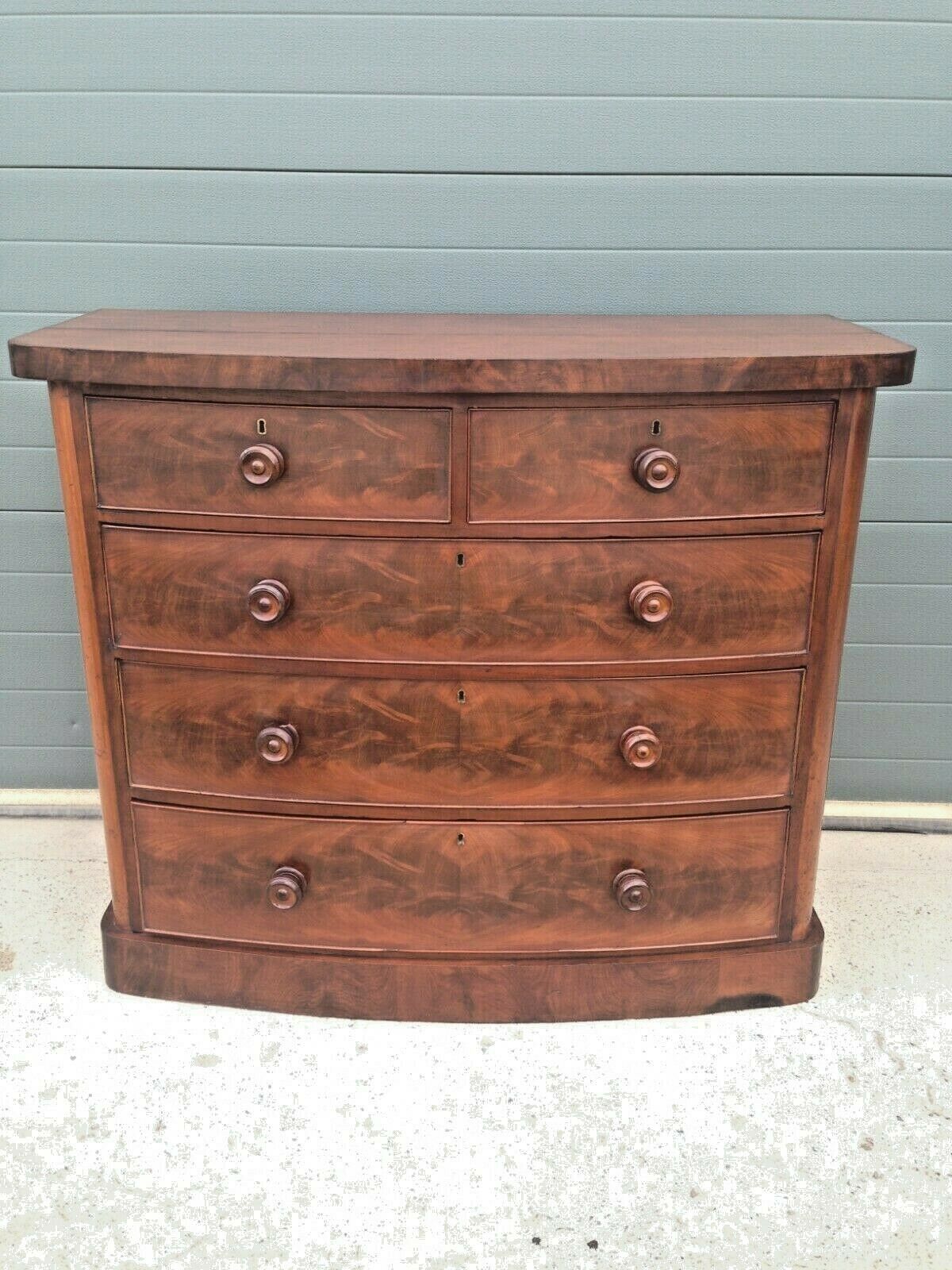 Antique Chest Of Drawers / Flame Mahogany Bow Front Chest ( SOLD )