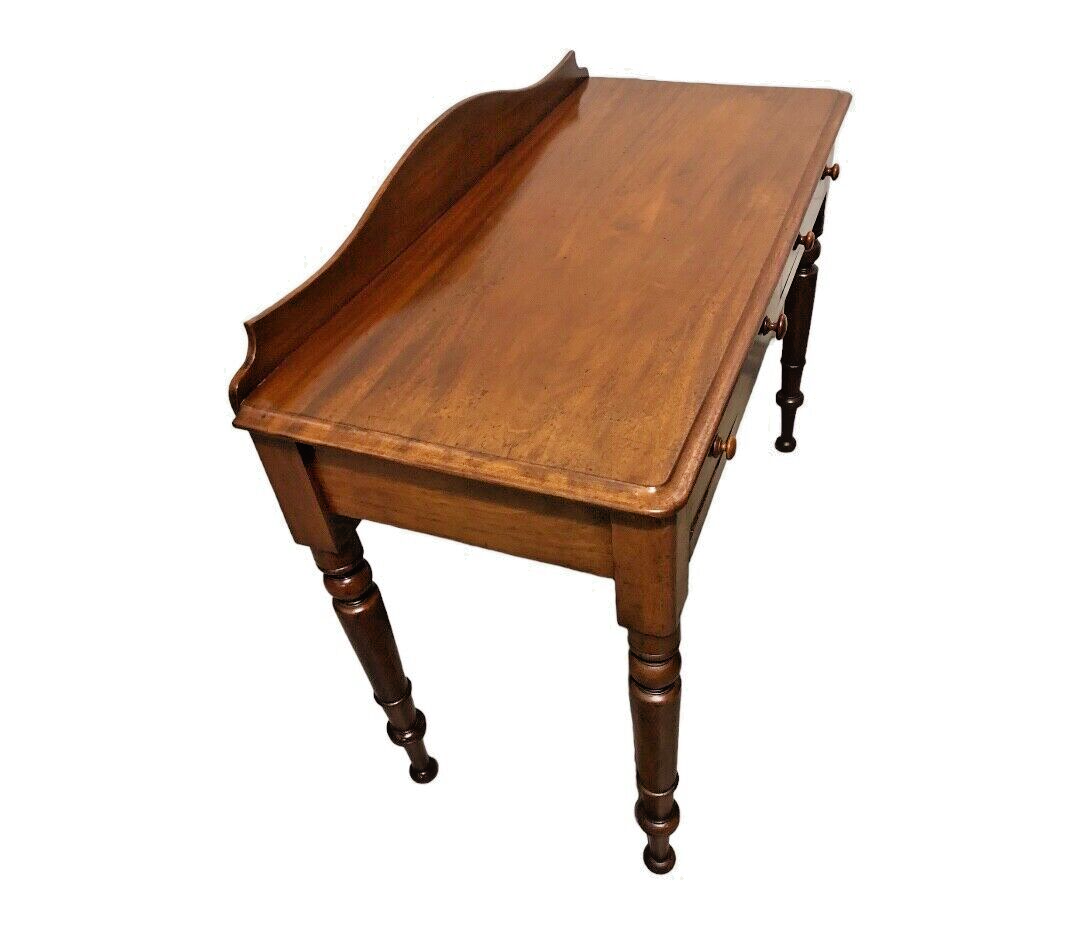 000811....Handsome Antique Mahogany Writing Table ( sold )