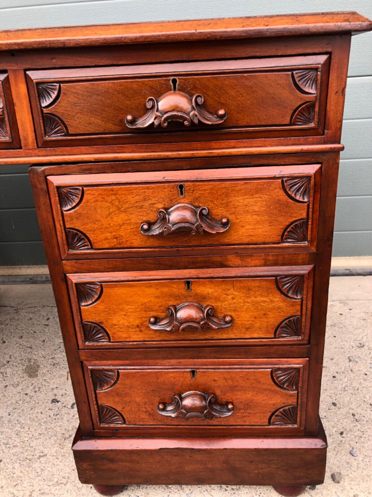 000904....Handsome Antique Carved Mahogany Pedestal Desk ( sold )