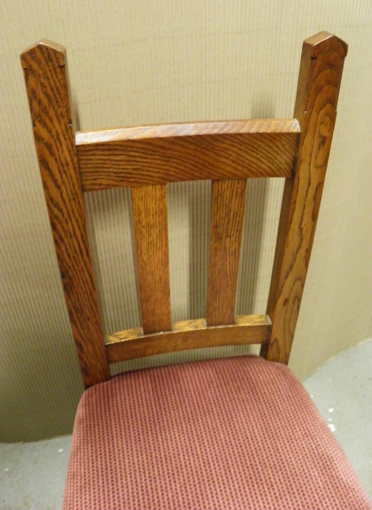 A Set Of Four Arts And Crafts Oak Dining Chairs