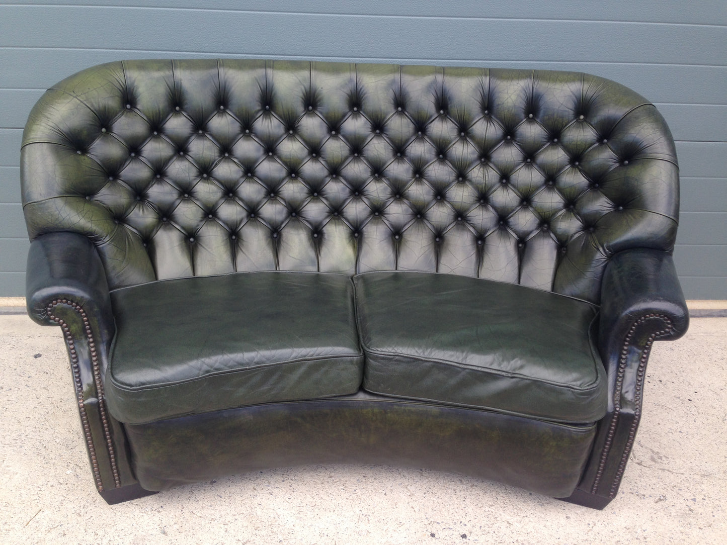 Handsome Curved Two Seat Chesterfield Leather Sofa ( SOLD )