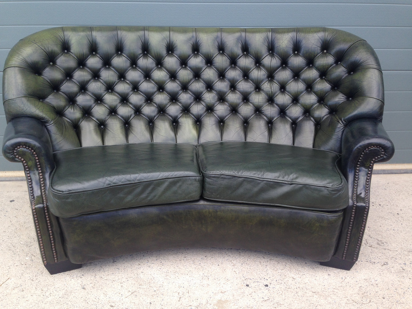 Handsome Curved Two Seat Chesterfield Leather Sofa ( SOLD )